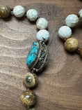 Load image into Gallery viewer, Hand-Carved Bone Horse Necklace with Turquoise Accents – Artisan Made in Nepal