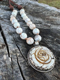 Load image into Gallery viewer, Hand Carved Bone Pendant with Rose Design