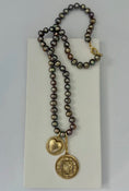 Load image into Gallery viewer, Necklace with brown pearls and gold plated pendant, sewn together with silk.