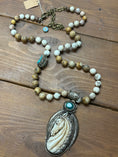 Load image into Gallery viewer, Hand-Carved Bone Horse Necklace with Turquoise Accents – Artisan Made in Nepal
