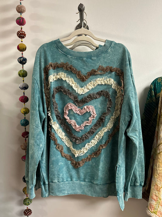 Vintage blue heart appliqué sweatshirt by a rare bird. 