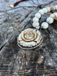 Load image into Gallery viewer, Hand Carved Bone Pendant with Rose Design
